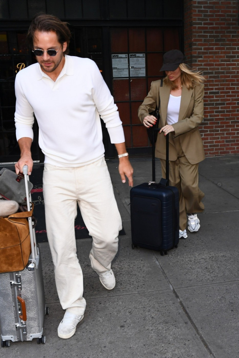 *EXCLUSIVE* Margot Robbie and Tom Ackerley spotted leaving NYC hotel with suitcases