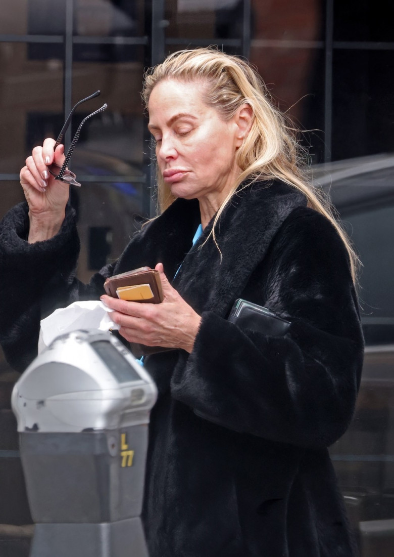 *PREMIUM-EXCLUSIVE* Christina Fulton continues her recovery after son Weston Cage allegedly attacked her at her home ealier in the month, as a detective vehicle is seen leaving her apartment