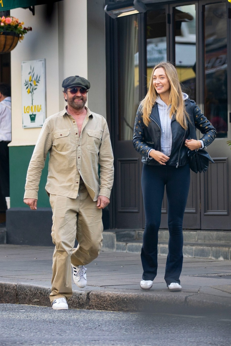 *PREMIUM-EXCLUSIVE* MUST CALL FOR PRICING BEFORE USAGE  - WEB EMBARGO UNTIL 13.45PM UK TIME (8.45 am ET/5.45 am PST) ON 4th JULY 2024 - Scottish actor Gerard Butler, 54, spotted cosying up to stunning Sports Illustrated model, 29-year-old Penny Lane in L