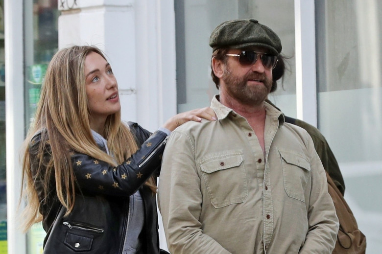 *PREMIUM-EXCLUSIVE* MUST CALL FOR PRICING BEFORE USAGE  - WEB EMBARGO UNTIL 13.45PM UK TIME (8.45 am ET/5.45 am PST) ON 4th JULY 2024 - Scottish actor Gerard Butler, 54, spotted cosying up to stunning Sports Illustrated model, 29-year-old Penny Lane in L