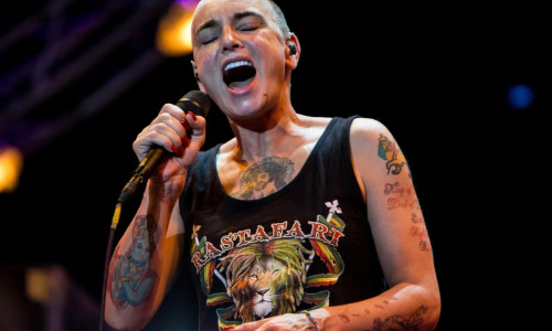 Lugano Switzerland. 11th July 2014. The Irish singer songwriter SINEAD O'CONNOR performs live at Piazza Della Riforma during the 