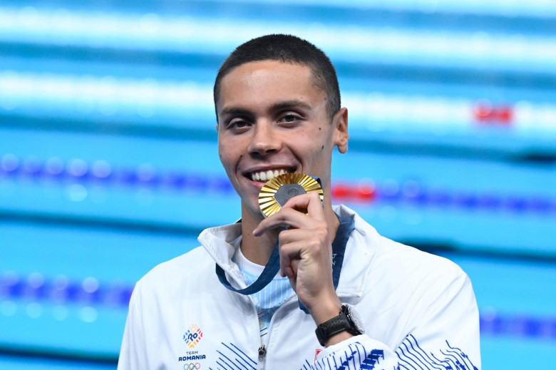 Popovici David ( ROU ) celebrates with his medal during the 2024 Olympics Games Swimming at Paris La Defense Arena on Ju