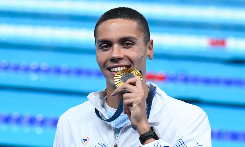 Popovici David ( ROU ) celebrates with his medal during the 2024 Olympics Games Swimming at Paris La Defense Arena on Ju