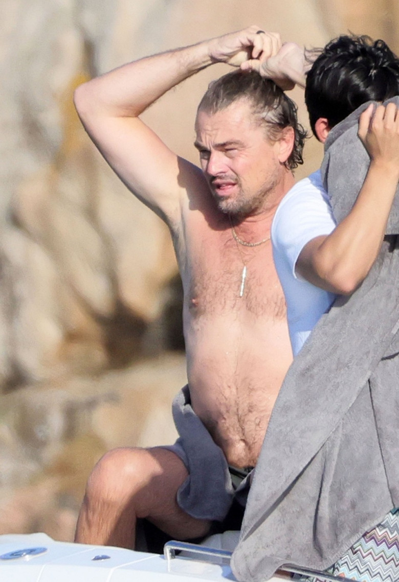 *PREMIUM-EXCLUSIVE* *MUST CALL FOR PRICING* Leonardo DiCaprio suffers a jellyfish bite while at sea with his girlfriend Vittoria Ceretti and a host of celebrity friends aboard a yacht in Sardinia.