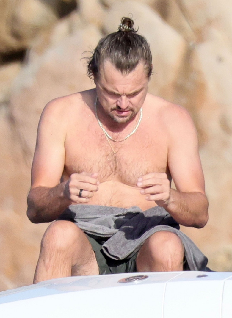 *PREMIUM-EXCLUSIVE* *MUST CALL FOR PRICING* Leonardo DiCaprio suffers a jellyfish bite while at sea with his girlfriend Vittoria Ceretti and a host of celebrity friends aboard a yacht in Sardinia.