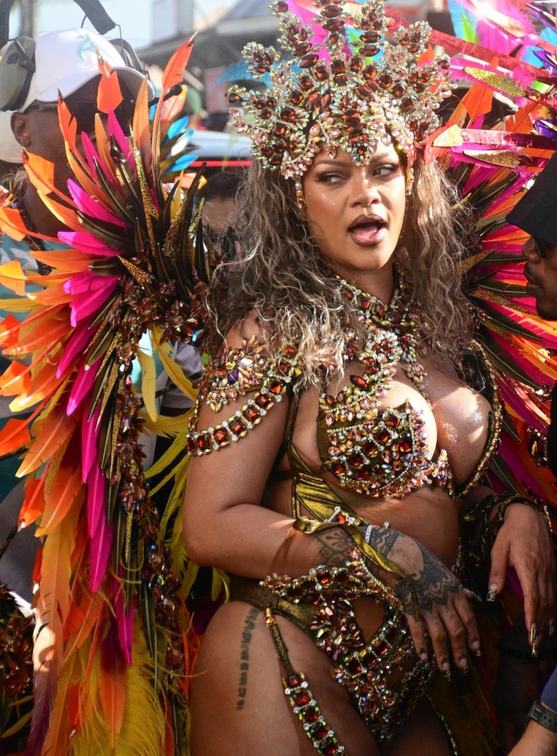 *EXCLUSIVE* Rihanna Dazzles in Bejeweled, Curve-Baring Carnival Costume