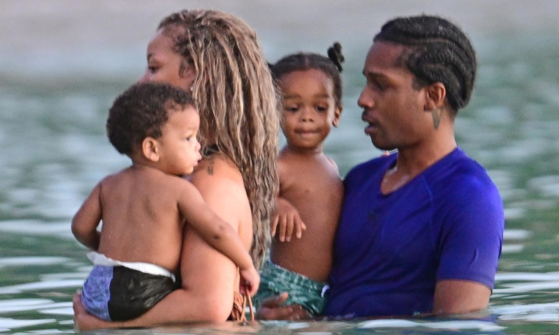 *PREMIUM-EXCLUSIVE* *MUST CALL FOR PRICING* The Grammy-Winning Superstar Rihanna wears her sultry black maxi beach dress watching the sun go down and taking a dip in the sea with her beau Asap Rocky during their family holiday in Barbados.**PICTURES TAKE