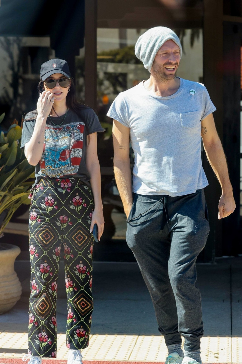 *EXCLUSIVE* Chris Martin and Dakota Johnson share a laugh on a coffee run together in Malibu