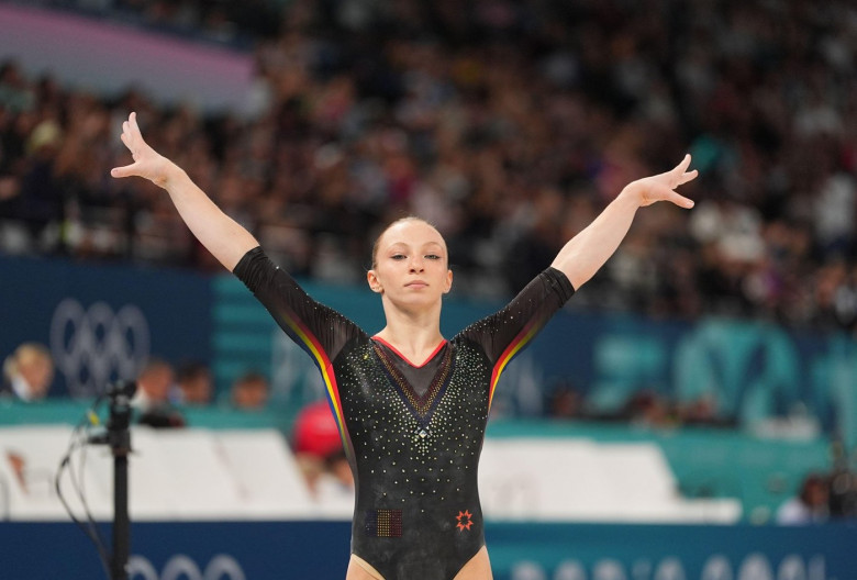 Paris, France. 1 January, 2024.  Ana Barbosu (Romania) competes during the balance beam  at Bercy Arena, Paris, France. Credit: Ulrik Pedersen/Alamy