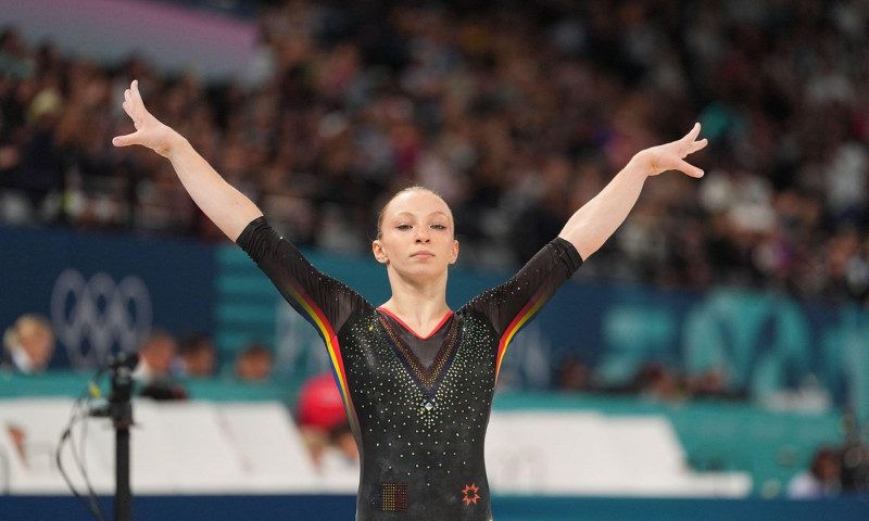 Paris, France. 1 January, 2024.  Ana Barbosu (Romania) competes during the balance beam  at Bercy Arena, Paris, France. Credit: Ulrik Pedersen/Alamy