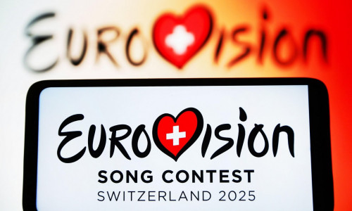 Ukraine. 12th Aug, 2024. In this photo illustration, an Eurovision Song Contest 2025 (ESC) logo is seen on a smartphone screen. The Eurovision Song Contest 2025 is scheduled to take place in May 2025 in Switzerland. Credit: SOPA Images Limited/Alamy Live