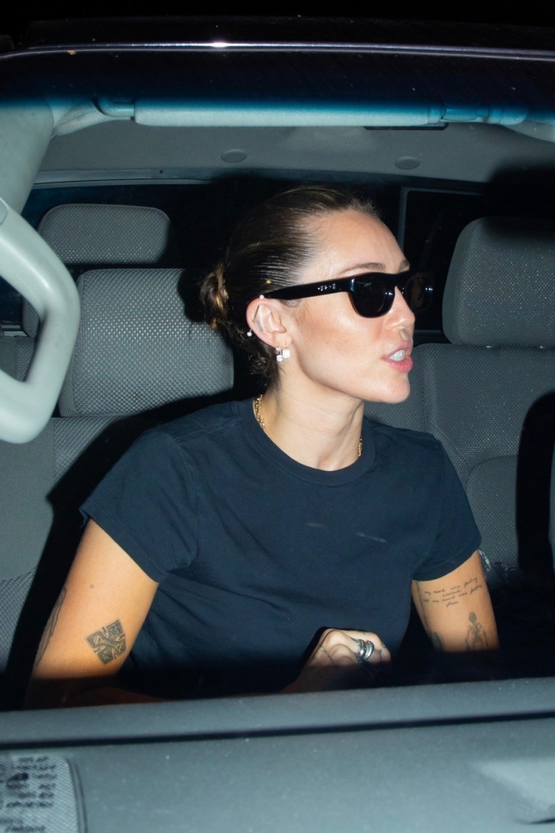 *EXCLUSIVE* Miley Cyrus Looks Cool in Shades While Leaving Boyfriend’s Concert in West Hollywood