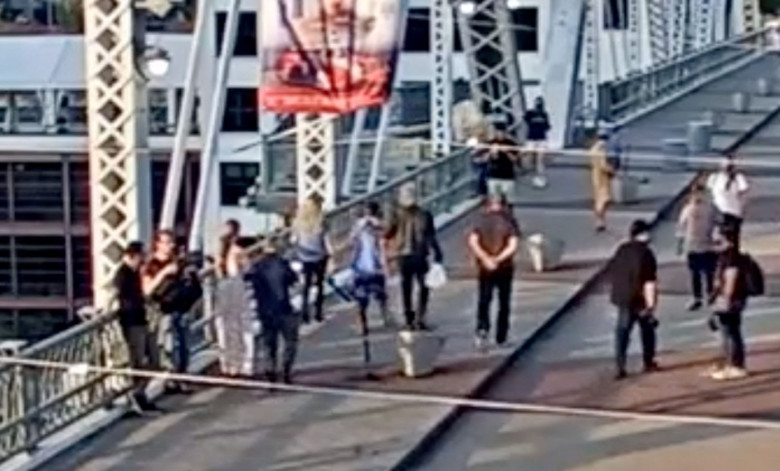 Jon Bon Jovi convinces apparently suicidal woman not to jump from a bridge in dramatic video