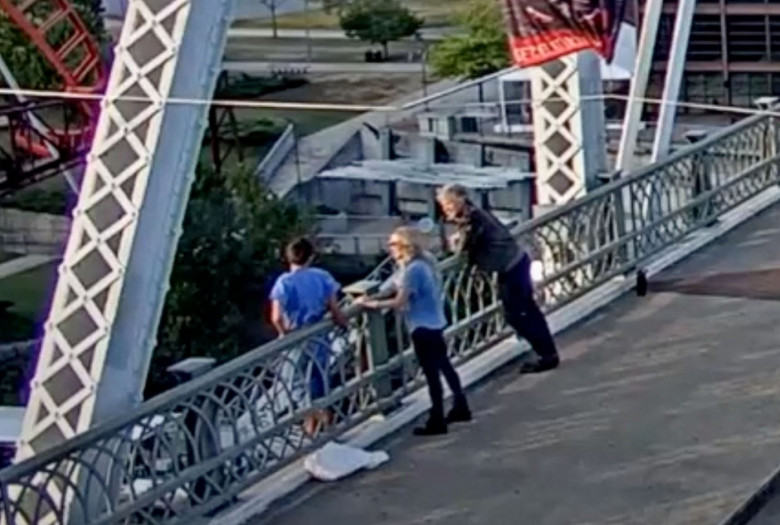 Jon Bon Jovi convinces apparently suicidal woman not to jump from a bridge in dramatic video