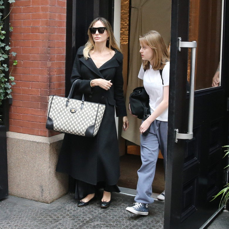 Angelina Jolie and Vivienne Jolie-Pitt check out of the Mercer Hotel in New York City