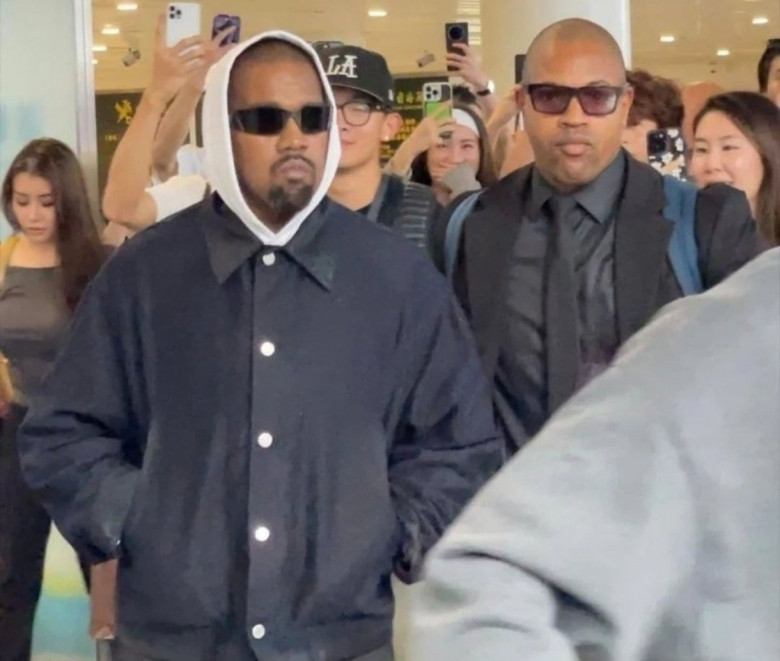 Kanye West arrives at Haikou Airport