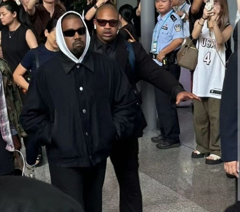 Kanye West arrives at Haikou Airport