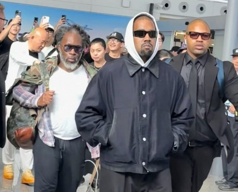 Kanye West arrives at Haikou Airport