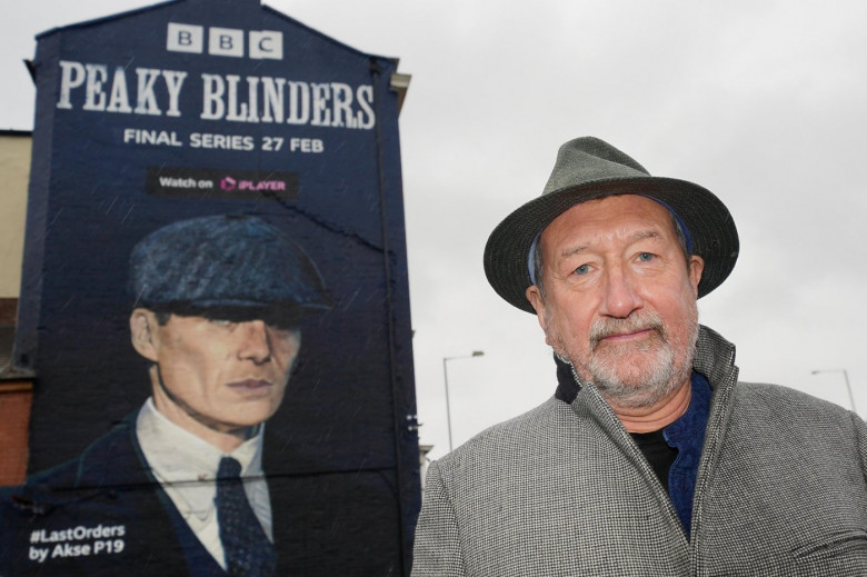 Peaky Blinders creator Steven Knight at the unveiling of a mural by artist Akse P19, of actor Cillian Murphy, as Peaky Blinders crime boss Tommy Shelby, in the historic Deritend area of Birmingham, ahead of the sixth and final series of the hit BBC One cr