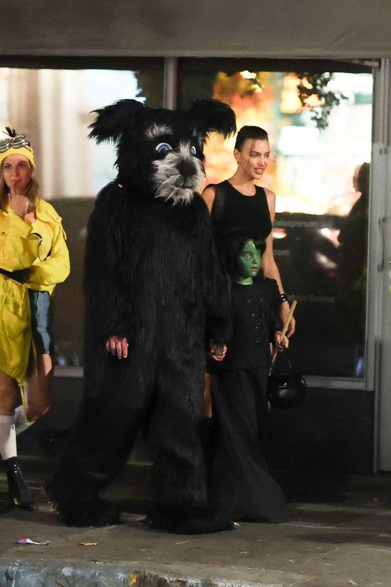 Irina Shayk costumes up as Lara Croft while trick-or-treating with Bradley Cooper and daughter Lea in NYC