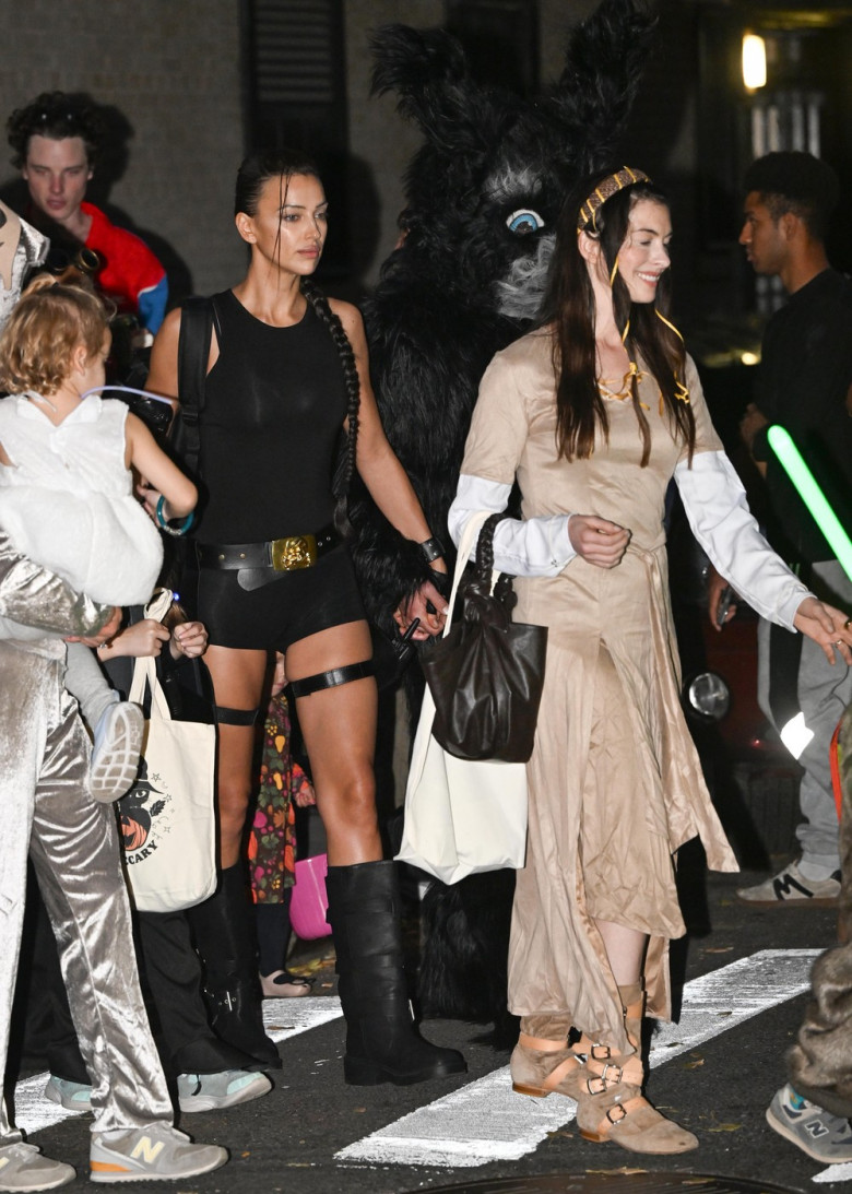 Irina Shayk Holds Hands With A Mystery Man While Trick Or Treating With Anne Hathaway In New York City