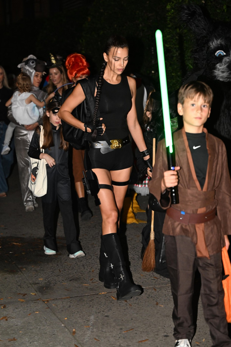 Irina Shayk Holds Hands With A Mystery Man While Trick Or Treating With Anne Hathaway In New York City