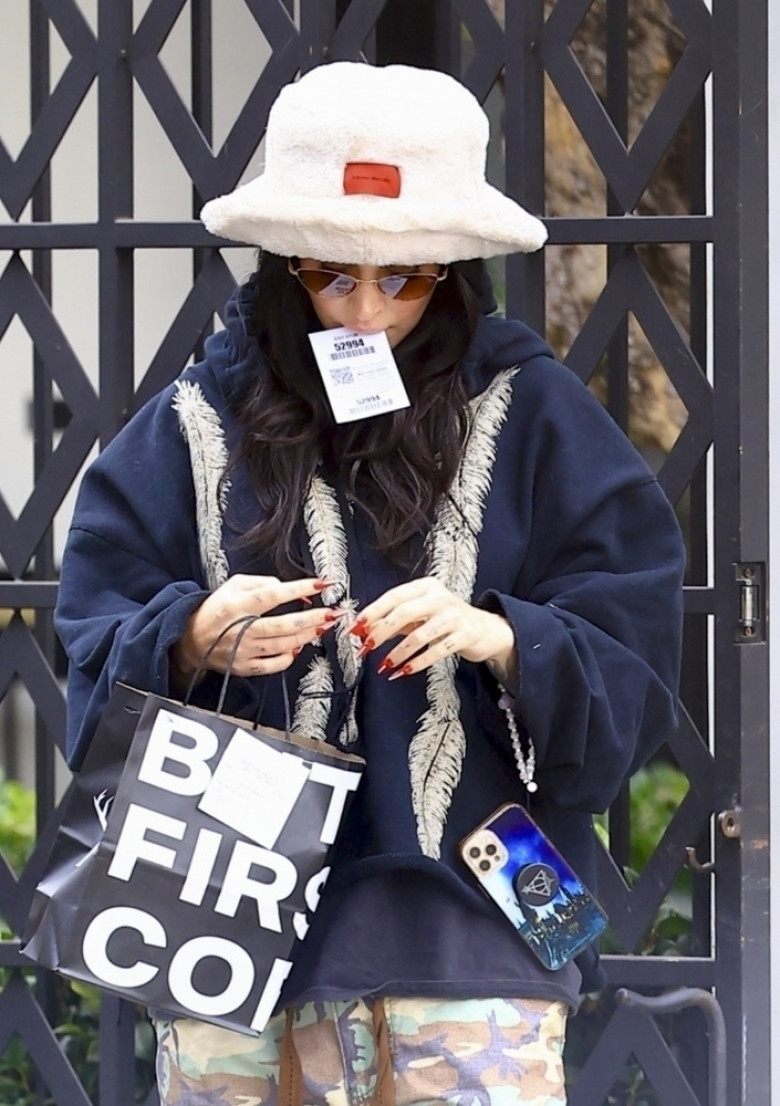 *EXCLUSIVE* Megan Fox spotted out and about solo in West Hollywood rocking big furry bucket hat