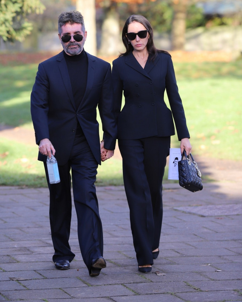 Simon Cowell and his partner Lauren Silverman leaving the Funeral of the Former One Direction star Liam Payne at St Mary’s Church in Amersham, Buckinghamshire.