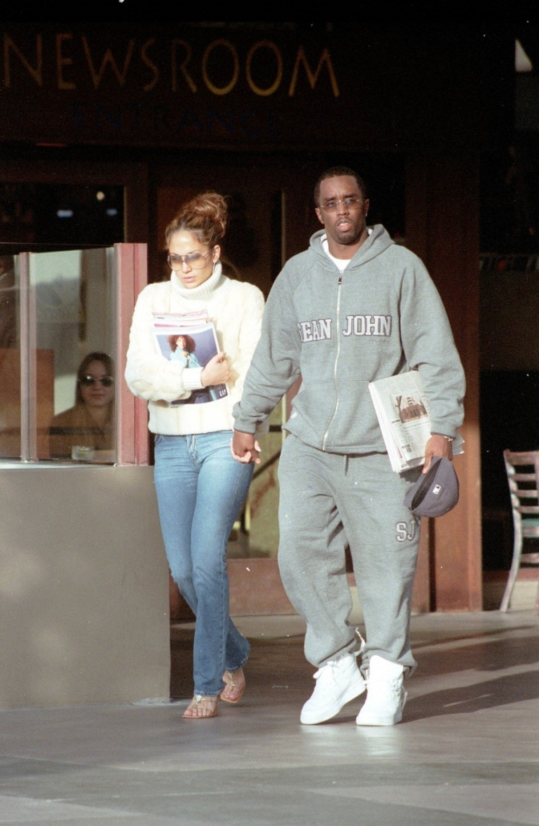 HOPING FOR A SECOND SHOT? DIDDY POSTS THIS TBT PIC OF HIM AND JLO FROM 2000!!!