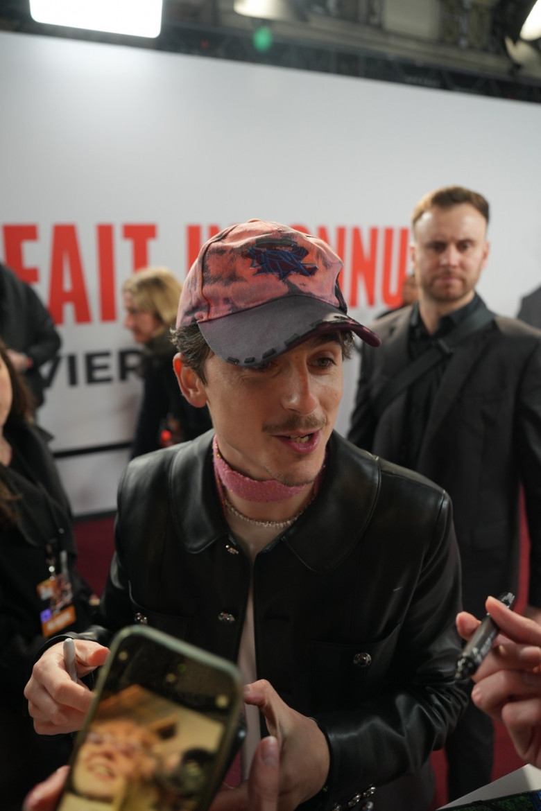 Timothee Chalamet arriving and leaving a complete unknown movie premiere in Paris