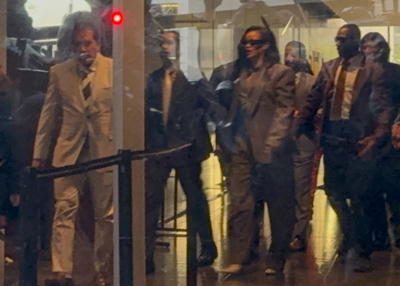 A$AP Rocky and Rihanna exit court after he is found innocent on both charges