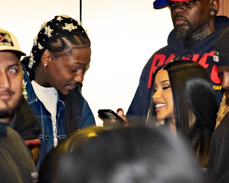 Cardi B and Stefon Diggs share a close moment as they leave Madison Square Garden