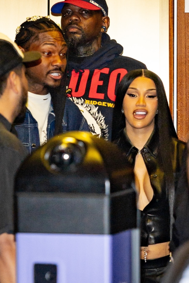 Cardi B and Stefon Diggs share a close moment as they leave Madison Square Garden