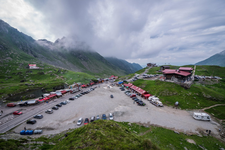 Parking lot next to glacier Balea Lake next to Transfagarasan Road in Fagaras Mountains (part of Carpathian Mountains), Romania