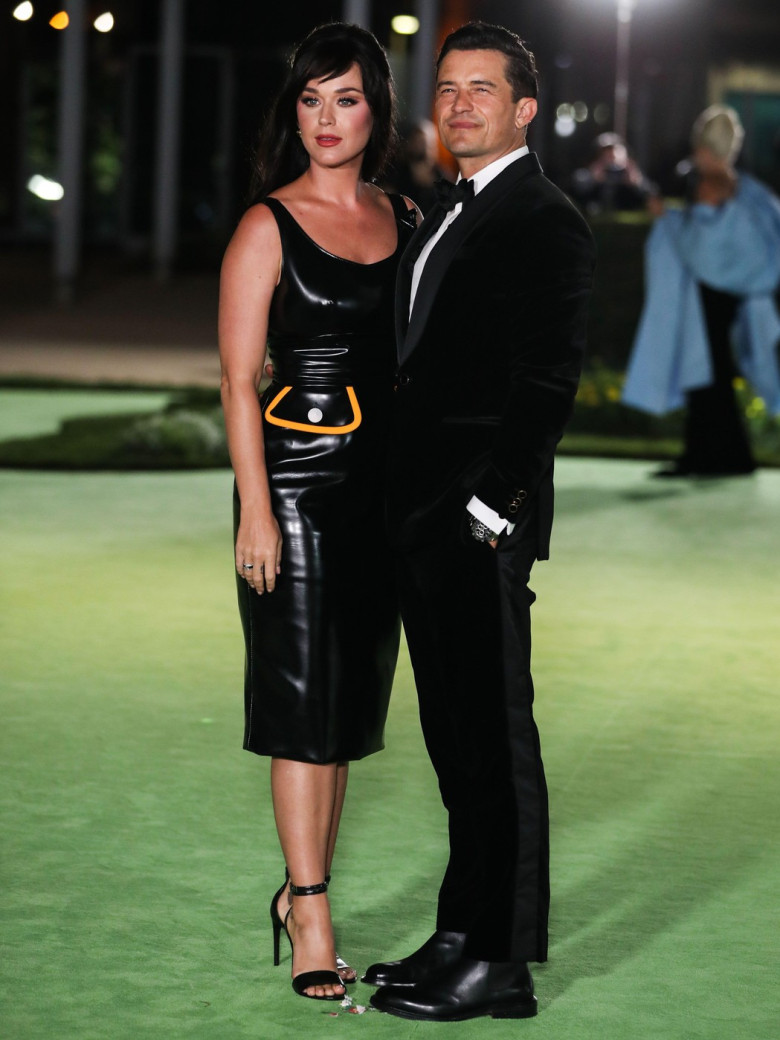 (FILE) Katy Perry Receives Backlash After Blue Origin Space Flight. LOS ANGELES, CALIFORNIA, USA - SEPTEMBER 25: American singer, songwriter, and TV personality Katy Perry wearing a Louis Vuitton dress and fiance/actor Orlando Bloom arrive at the Academy