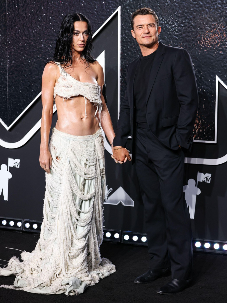 (FILE) Katy Perry Receives Backlash After Blue Origin Space Flight. ELMONT, NEW YORK, USA - SEPTEMBER 11: American singer, songwriter, and TV personality Katy Perry wearing Who Decides War and husband Orlando Bloom arrive at the 2024 MTV Video Music Award