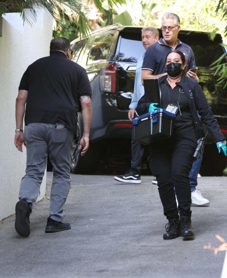 EXCLUSIVE: CSI are seen leaving Brad Pitt's home after long day of collecting fingerprinting as his security team called to his home after burglary
