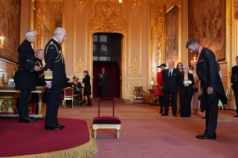Sir David Beckham is made a Knight Bachelor by King Charles III during an Investiture ceremony at Windsor Castle, Berkshire. The honour recognises services to sport and to charity. Picture date: Tuesday November 4, 2025.