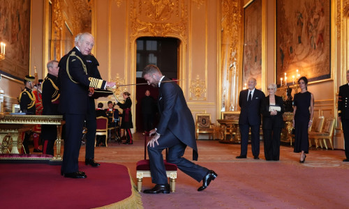 Sir David Beckham is made a Knight Bachelor by King Charles III during an Investiture ceremony at Windsor Castle, Berkshire. The honour recognises services to sport and to charity. Picture date: Tuesday November 4, 2025.