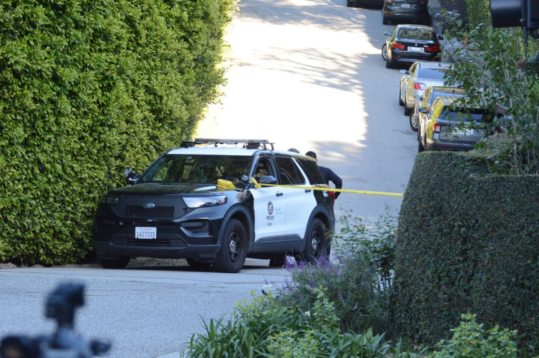 Police blocking Rihanna's street after scary shooting