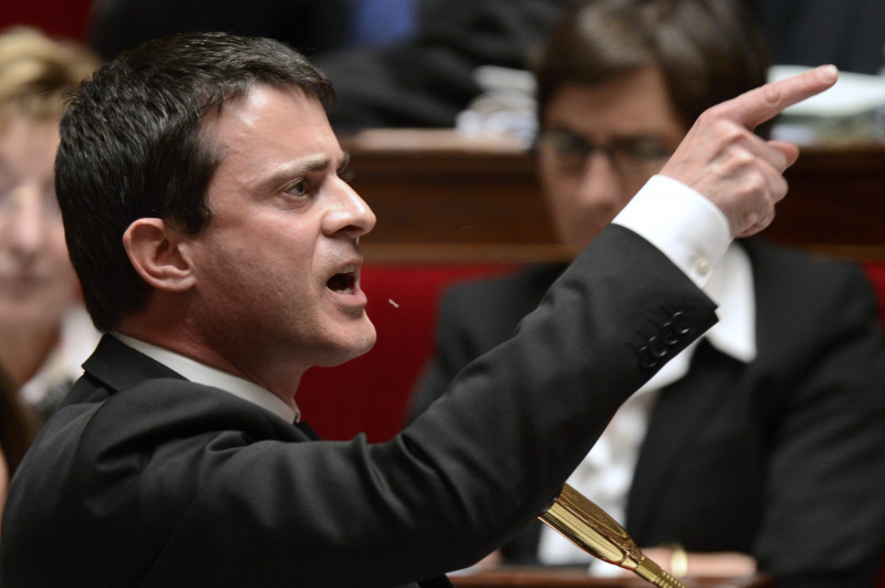French Interior Minister Manuel Valls speaks during the weekly session of questions to the government at the French National Assembly in Paris on November 13, 2012. The Minister of the Interior Manuel Valls accused today the right to be responsible of the "return of terrorism" in the country during a debate at the National Assembly, causing the fury of the opposition and the lifting the session. AFP PHOTO BERTRAND GUAY