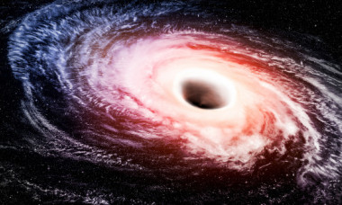 O gaură neagră masivă, „de 30 de miliarde de ori cât masa Soarelui”, descoperită de astronomi britanici