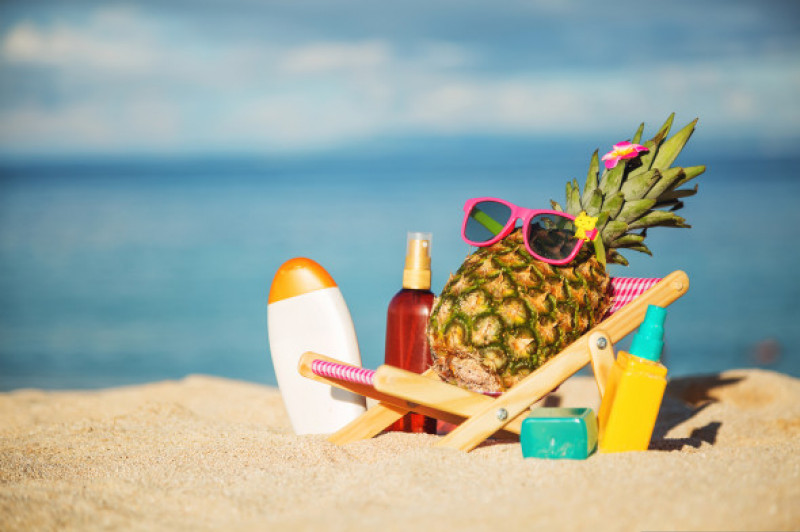 Ripe,Attractive,Girl-pineapple,Lying,On,Sun,Chair,On,The,Sand