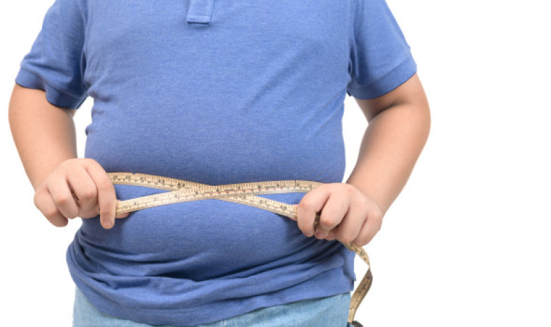 Obese,Fat,Boy,Measuring,Tape,Of,Stomach,Isolated,On,White