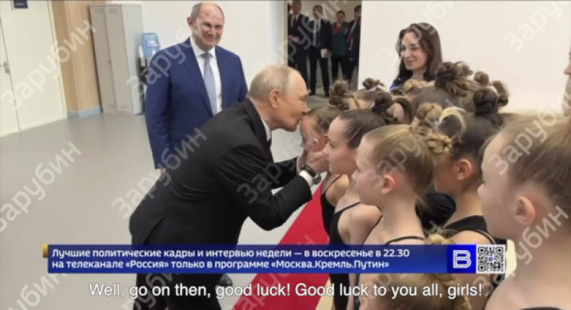 Putin kissed young gymnast