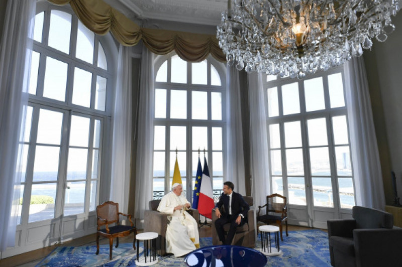 Pope Francis meets with the French President Emmanuel Macron at the Palais du Pharo in the southern port city of Marseille.