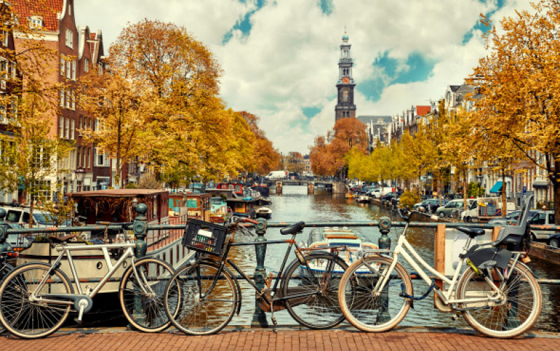 Bike,Over,Canal,Amsterdam,City.,Picturesque,Town,Landscape,In,Netherlands