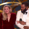 Christina Applegate gets a standing ovation as she walks out on stage with a cane to present at the Emmy Awards