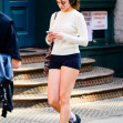 *EXCLUSIVE* *Suri Cruise enjoys a spring time solo stroll in New York with headphones. Looking relaxed and sporty in short shorts and sneakers.
