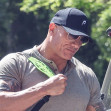 *EXCLUSIVE* Don't mess with The Rock! Dwayne Johnson shows off his bulked muscles after reports of continuing feud with Ryan Reynolds on new film set*** Web must call for pricing ***